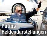 Russischer Premierminister Wladimir Putin winkt von einem Harley-Davidson-Lehman-Motorrad