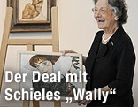 Elisabeth Leopold mit einem Faksimilie von Schieles "Bildnis Wally"