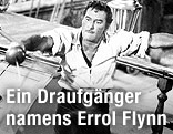 Schauspieler Errol Flynn mit Degen