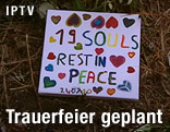 Schild mit Aufschrift "19 Souls rest in peace"