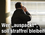 Mann mit Telefon