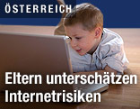 Kind mit Notebook