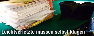 Richterhut und Akten