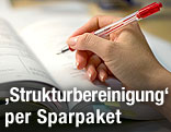 Rotstift &uuml;ber Buch