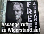 Plakat mit aufgedrucktem Porträt von WikiLeaks-Gründer Assange