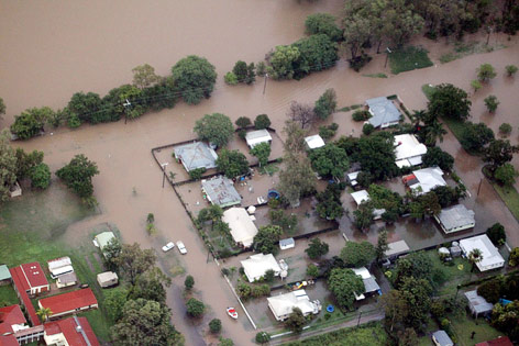 © APA/EPA/The Courier Mail/David Kapernick Luftaufnahme einer überfluteten Stadt in Australien