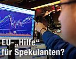 B&ouml;rsenh&auml;ndler vor Bildschirm