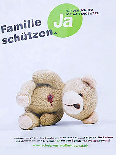 © APA/KEYSTONE/Walter Bieri Plakat für ein Ja zur Waffenschutz-Initiative