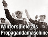 Mitglieder der österreichischen Mannschaft erweisen den olympischen Gruss.(Originaltext) - Februar 1936
