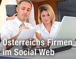 Gesch&auml;ftsleute mit Laptop