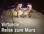 Forscher in Raumanz&uuml;gen simulieren eine <br />
Landung auf dem Mars im Mission Control Center bei Moskau.