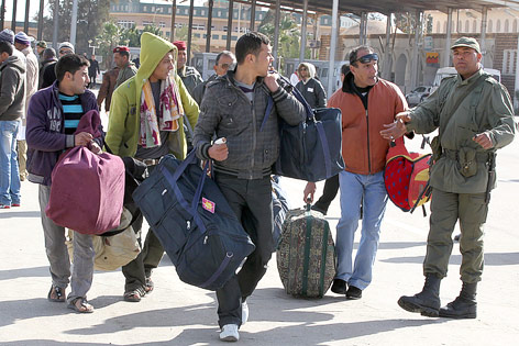 © APA/EPA/Mohamed Messara Ägypter verlassen Libyen mit ihrem Hab und Gut