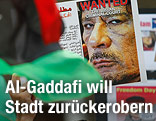 Demonstranten mit Bild von Al-Gaddafi