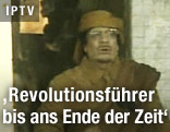 Muammar Al-Gaddafi