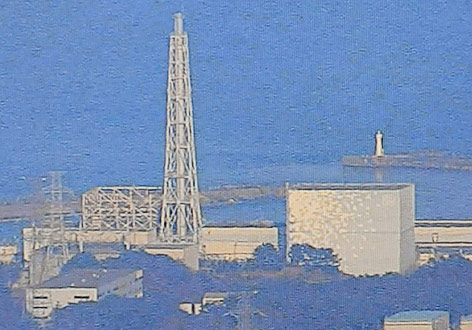 © AP/NHK TV via Kyodo News Luftaufnahme eines zerstörten Reaktors des Atomkraftwerks Fukushima