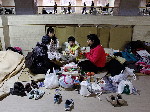 © Reuters/Jo Yong hak Evakuierte Familie in Schutzzentrum