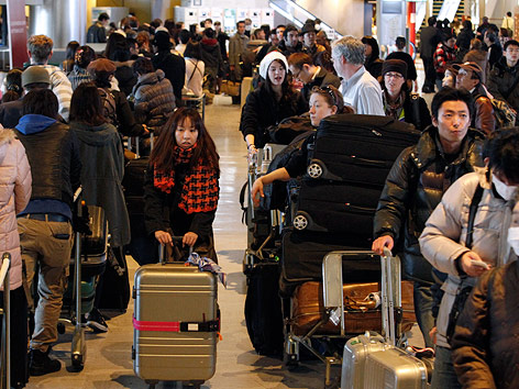 © Reuters/Issei Kato Ausländische Passagiere am Flughafen in Tokio