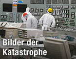 Arbeiter im Kontrollraum in Fukushima
