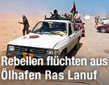 Rebellen flüchten mit einem Auto