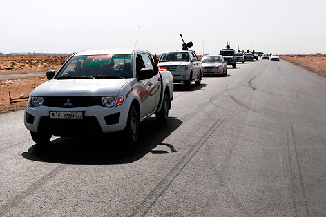 © Reuters/Youssef Boudlal Rebellen auf dem Weg nach Sirte
