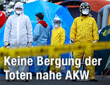 Arbeiter bei Evakuierung