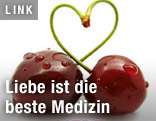 Kirschen bilden ein Herz