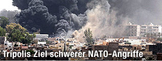 Rauchschwaden über Tripolis