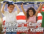 Kinder laufen in einer Wiese mit einer US-Flagge