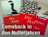 Aufgefächerte Bücher von Albert Camus