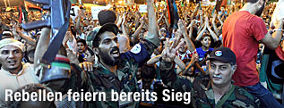 Rebellen in Tripolis feiern Sieg &uuml;ber Gaddafi