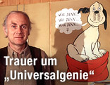 Loriot neben Poster seines Cartoon Charakters Wum