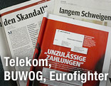 Aufgeschlagene Zeitungen