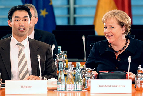 © APA/dpa/Wolfgang Kumm Deutsche Bundeskanzlerin Angela Merkel (CDU) und Philipp Rösler (FDP)