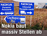 Wegweiser vor dem Nokia-Werk in Cluj, Rumänien