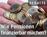 Hand voll Euromünzen