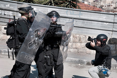 © Ruben Salvadori Sicherheitskräfte und Fotograf