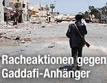 Waffe mit libyscher Flagge