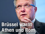 Währungskommissar Rehn während einer Ansprache