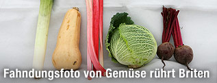 Fahndungsfoto mit Gemüse