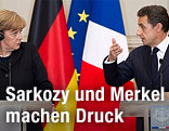 Deutsche Bundeskanzlerin Angela Merkel und Frankreichs Präsident Nicholas Sarkozy