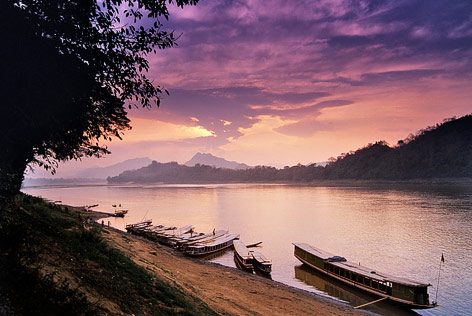 © Corbis/Ron Watts Sonnenuntergang am Mekongfluss in Laos