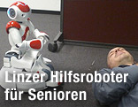 Home-Care-Roboter neben einem auf dem Boden liegenden Mann