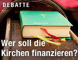Gotteslob auf einer Kirchenbank
