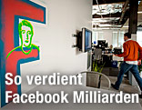 Zuckerbergs Kopf und ein gro&szlig;es F auf einer Wand gemalt