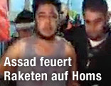 Syrische Einwohner laufen durch die Straßen