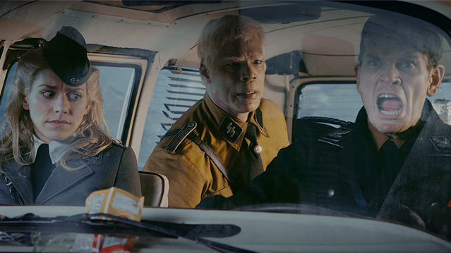 © Blind Spot Julia Dietze, Christopher Kirby und Götz Otto in "Iron Sky"