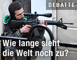Syrischer Rebell mit Maschinengewehr
