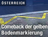 Gelbe Zick-Zack-Bodenmarkierung