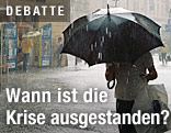 Mensch mit Regenschirm