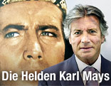der französische Schauspieler Pierre Brice steht vor einem Winnetou-Plakat